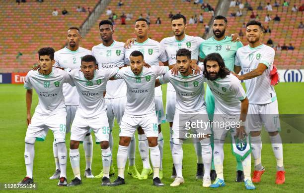 Ahli's defender Saeed Al-Mowalad, forward Djaniny, defender Aderlan, forward Omar Al Somah, goalkeeper Mohammed Al-Owais, defender Paulo Diaz,...