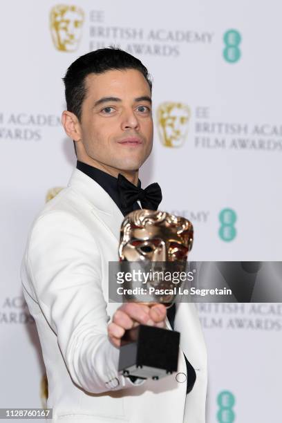 Winner of the Leading Actor award for Bohemian Rhapsody, Rami Malek poses in the press room during the EE British Academy Film Awards at Royal Albert...