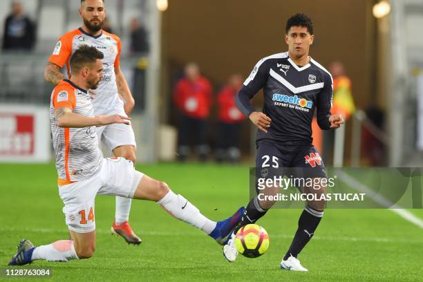 Bordeaux's Brazilian defender Pablo vies with Monpellier's French defender Damien Le Tallec during the French L1 football match between FC Girondins...