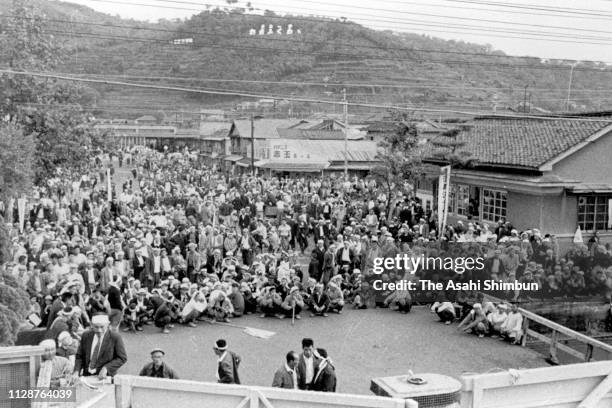 Fishermen stage a sit-in in front of the Japan New Chisso Minamata Factory to demand the halt of waste water discharge on November 2, 1959 in...