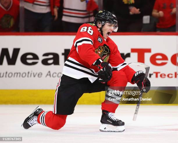 Patrick Kane of the Chicago Blackhawks celebrates after scoring a goal in the third period against the Detroit Red Wings at the United Center on...