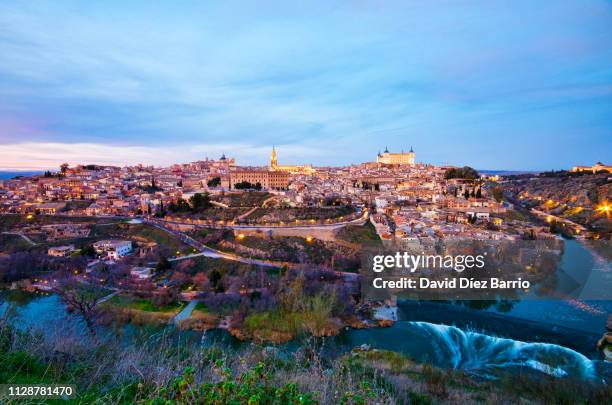 spain, panorama view of toledo in the sunset - toledo stockfoto's en -beelden