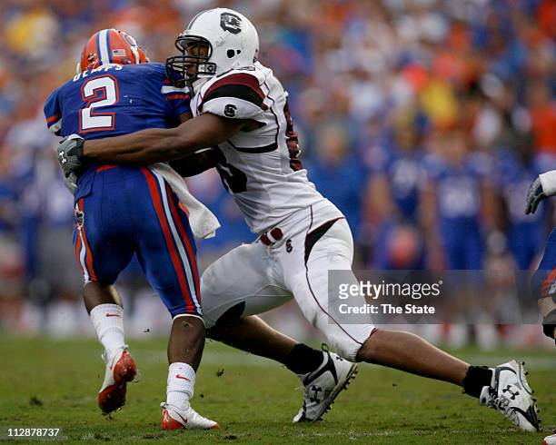 Florida running back Jeffery Demps picks up three yards before he is brought down by South Carolina defensive end Cliff Matthews during the second...