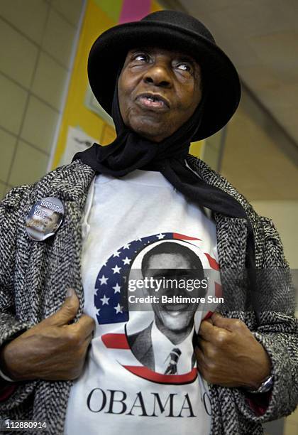 Ursuline Purnell shows off her Democratic presidential hopeful T-shirt of Sen. Barack Obama on Tuesday, February 12 at Gwynns Falls Elementary School...