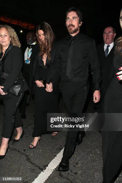 Sibi Blazic and Christian Bale seen leaving the 72nd annual EE British Academy Film Awards held at London's Royal Albert Hall on February 10, 2019 in...