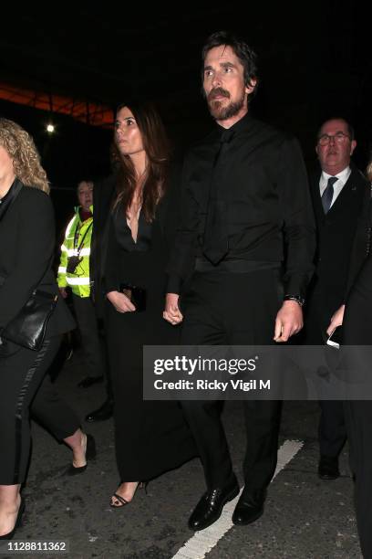 Sibi Blazic and Christian Bale seen leaving the 72nd annual EE British Academy Film Awards held at London's Royal Albert Hall on February 10, 2019 in...