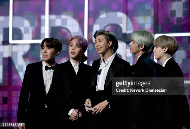 Jungkook, Jimin, Suga, Jin, RM, and J-Hope of BTS speak onstage during the 61st Annual GRAMMY Awards at Staples Center on February 10, 2019 in Los...