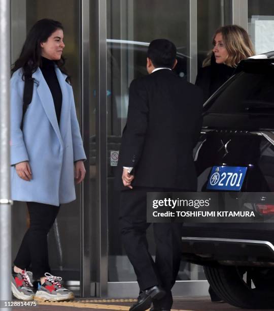 Carole Ghosn , wife of former Nissan chairman Carlos Ghosn, and his daughter Caroline leave after Ghosn left the Tokyo Detention House following his...