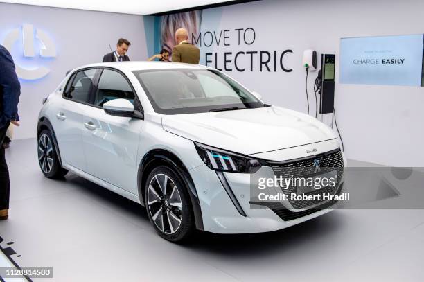 Peugeot e-208 Allure is displayed during the second press day at the 89th Geneva International Motor Show on March 5, 2019 in Geneva, Switzerland.