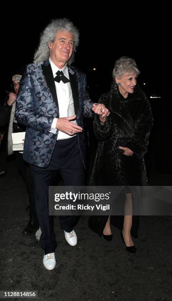 Anita Dobson and Brian May seen leaving the 72nd annual EE British Academy Film Awards held at London's Royal Albert Hall on February 10, 2019 in...