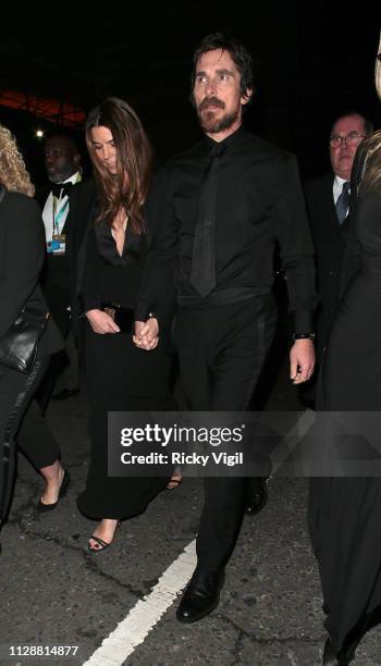 Sibi Blazic and Christian Bale seen leaving the 72nd annual EE British Academy Film Awards held at London's Royal Albert Hall on February 10, 2019 in...