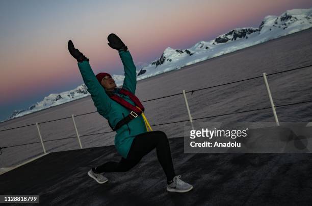Sahika Ercumen, an internationally renowned Turkish diver, exercises on the deck of the Betanzos sailing under the colors of Chile, in Antarctica on...