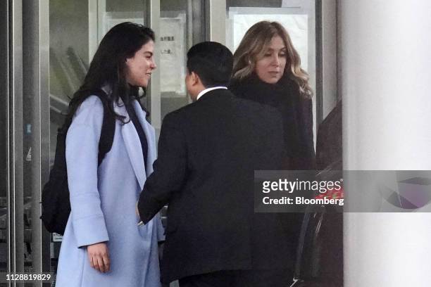 Caroline Ghosn, daughter of former Nissan Motor Co. Chairman Carlos Ghosn, left, and Carole Ghosn, wife of Carlos Ghosn, right, leave the Tokyo...