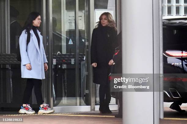 Caroline Ghosn, daughter of former Nissan Motor Co. Chairman Carlos Ghosn, left, and Carole Ghosn, wife of Carlos Ghosn, leave the Tokyo Detention...