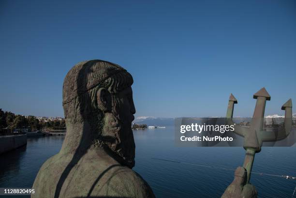 Statue of Poseidon, build at the old bridge of Chalkida