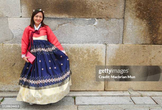 asian lady wearing korean traditional dress known as hanbok - korea traditional stock pictures, royalty-free photos & images