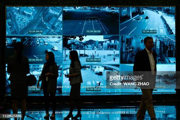 Journalists visit the Huawei Digital Transformation Showcase in Shenzhen, China's Guangdong province on March 6, 2019. - Chinese telecom giant Huawei...