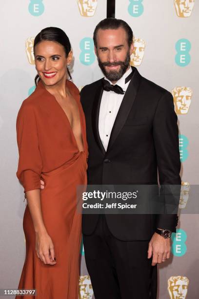 Maria Dolores Dieguez and Joseph Fiennes attend the EE British Academy Film Awards at Royal Albert Hall on February 10, 2019 in London, England.