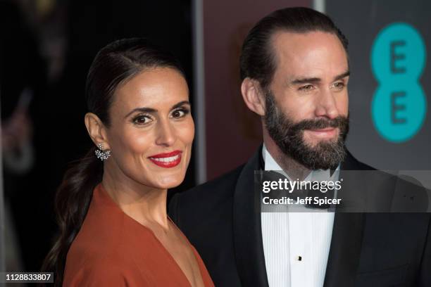 Maria Dolores Dieguez and Joseph Fiennes attend the EE British Academy Film Awards at Royal Albert Hall on February 10, 2019 in London, England.