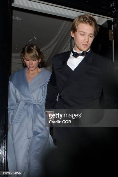Taylor Swift and Joe Alwyn seen attending the Vogue BAFTA party at Annabel's club in Mayfair on February 10, 2019 in London, England.