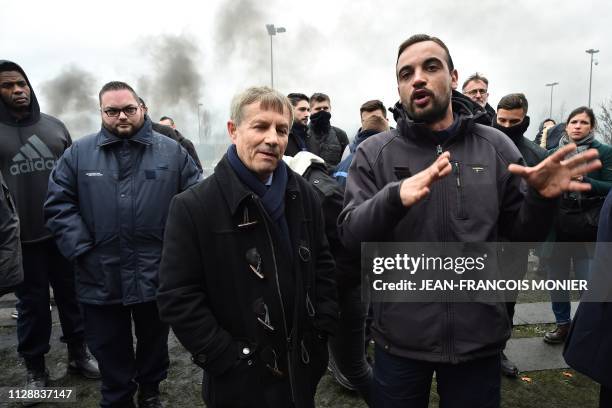 Orne's member of parliament and former head of the Fleury-Merogis' prison, Joaquim Pueyo speaks to prison guards blocking the entrance to the...