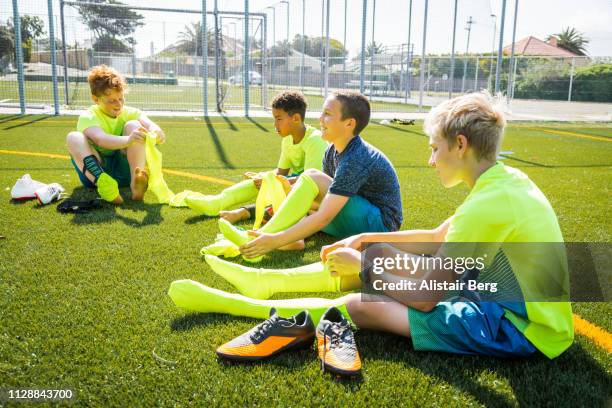 boys getting ready to play soccer - soccer field school stock pictures, royalty-free photos & images