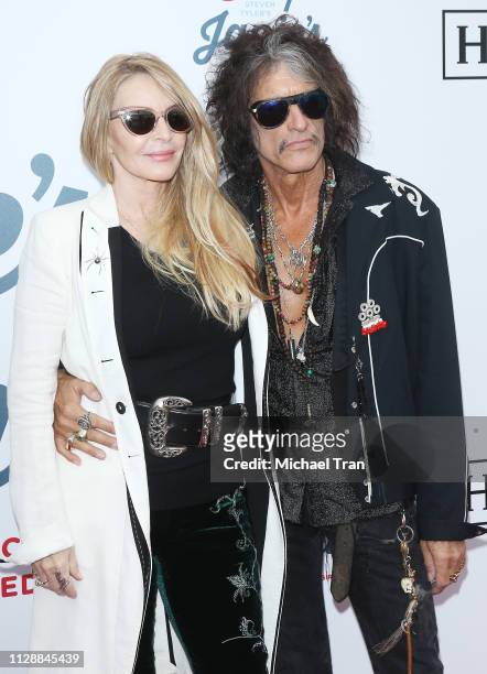 Joe Perry and Billie Paulette Montgomery attend Steven Tyler's GRAMMY Awards viewing party benefiting Janie's Fund held at Raleigh Studios on...