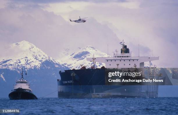 The Exxon Valdez is refloated and towed away from Bligh Reef in April of 1989.