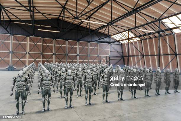 group of robots in warehouse - military intelligence stock pictures, royalty-free photos & images