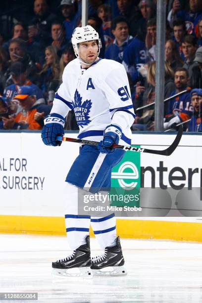 John Tavares of the Toronto Maple Leafs skates against the New York Islanders at NYCB Live's Nassau Coliseum on February 28, 2019 in Uniondale, New...