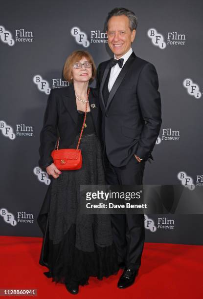 Joan Washington and Richard E. Grant attend the BFI Chairman's Dinner honouring Olivia Colman with the BFI Fellowship at Rosewood London on March 6,...