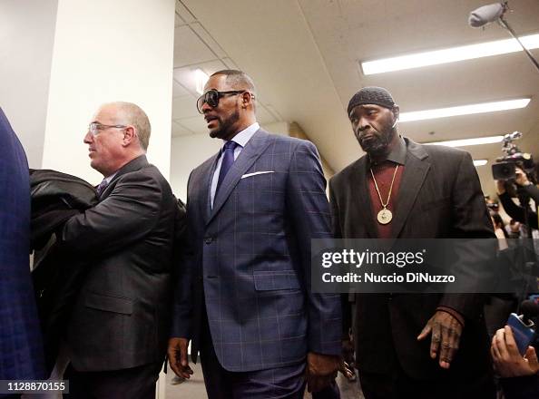 Kenneth Kelly Singe R Second from left, singer R. Kelly arrives at the Daley Center for his ...