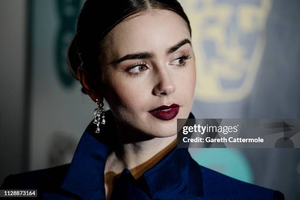 Lily Collins attends the EE British Academy Film Awards at Royal Albert Hall on February 10, 2019 in London, England.