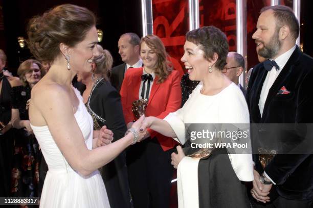 Catherine, Duchess of Cambridge meets Olivia Colman, and director Yorgas Lanthimos, 2nd right, and writer Tony McNamara, right, after the following...