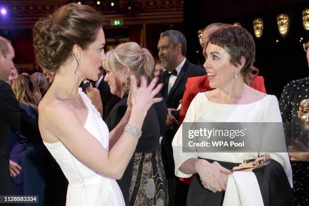 Catherine, Duchess of Cambridge meets Olivia Colman after the following the EE British Academy Film Awards at Royal Albert Hall on February 10, 2019...