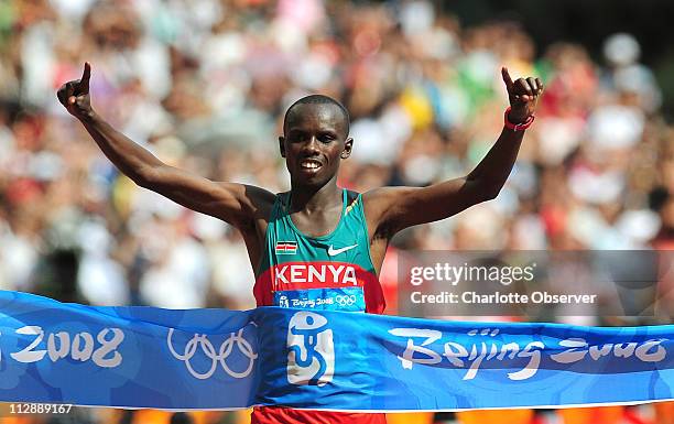 Sammy Wanjiru of Kenya crosses the finish line at the National Stadium to take gold in the marathon on Sunday, August 24 in the Games of the XXIX...