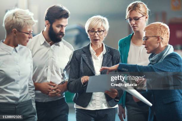 brief meeting on the move. - party board meets stock pictures, royalty-free photos & images