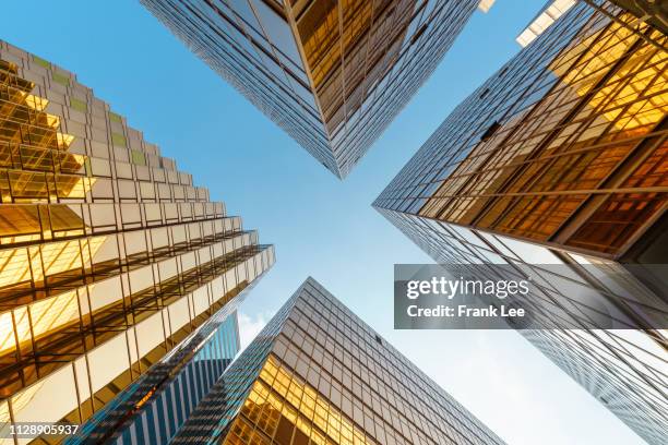 hong kong business building - looking up at buildings stock pictures, royalty-free photos & images