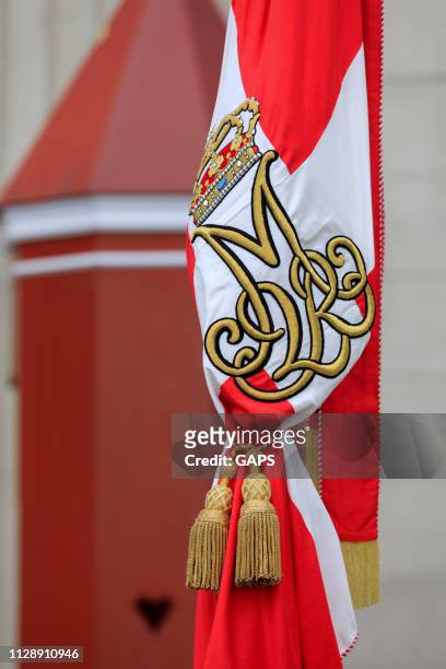 official flag of the danish royal family at amalienborg palace - amalienborg palace stock pictures, royalty-free photos & images