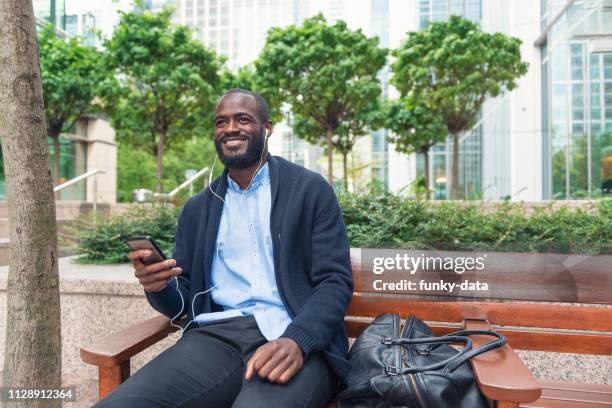 good times for business - canary wharf men stock pictures, royalty-free photos & images