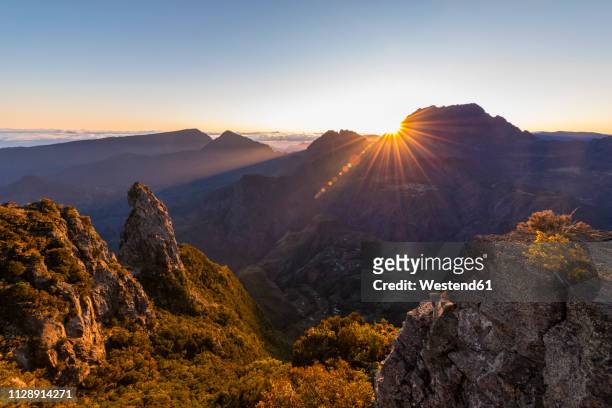 reunion, reunion national park, view from pito maido to cirque de mafate, gros morne and piton des neiges, sunrise - la reunion stock pictures, royalty-free photos & images