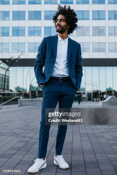 spain, barcelona, stylish young businessman standing in the city - smart shoes stock pictures, royalty-free photos & images