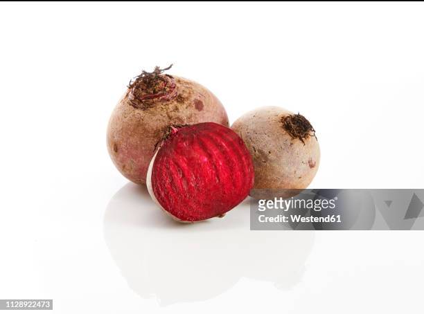 whole and sliced beetroot - brassica rapa stock pictures, royalty-free photos & images