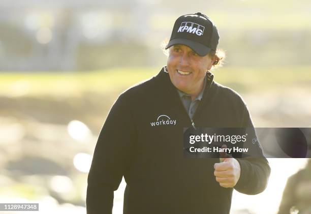 Phil Mickelson of the United States walks up the 18th hole during the continuation of the final round of the AT&T Pebble Beach Pro-Am at Pebble Beach...