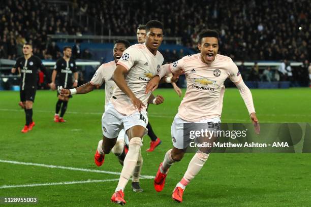 Marcus Rashford of Manchester United celebrates scoring a goal to make the score 1-3 with Mason Greenwood during the UEFA Champions League Round of...