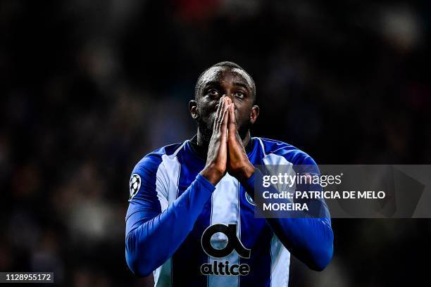 Porto's Malian forward Moussa Marega reacts to a missed goal opportunity during the UEFA Champions League round of 16 second leg football match...