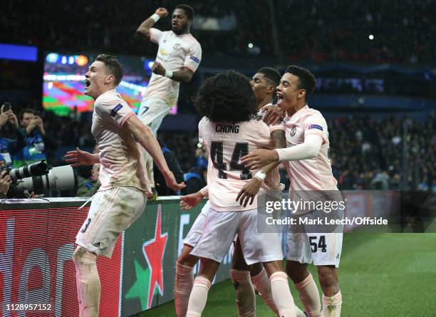 Marcus Rashford of Man Utd celebrates scoring the winning goal from the penalty spot with Scott McTominay, Tahith Chong and Mason Greenwood during...