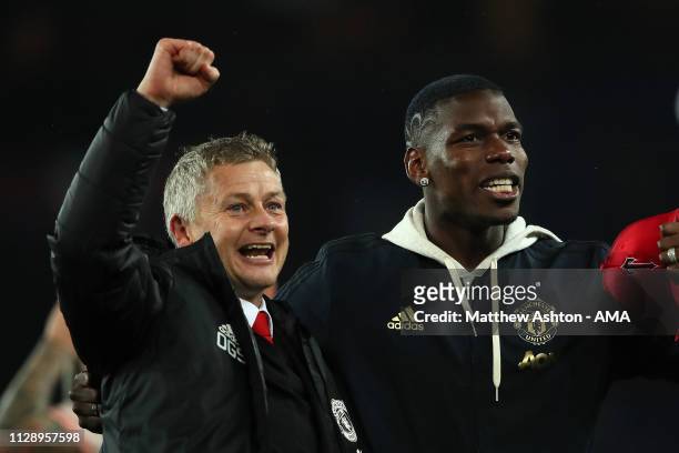 Manchester United Head Coach / Manager Ole Gunnar Solskjaer and Paul Pogba of Manchester United celebrate at the end of the UEFA Champions League...