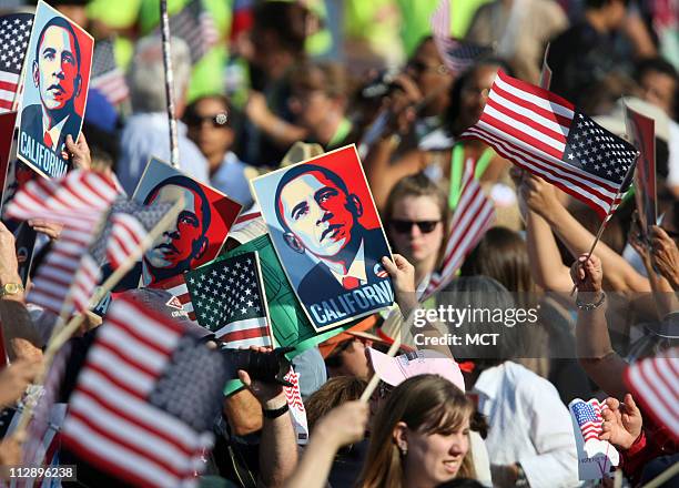 California delegates hold signs supporting Democratic presidential candidate Barack Obama during the final day of Democrat National Convention at...