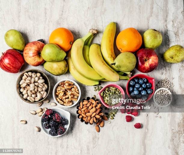 variety of fruits and nuts - つまみ ストックフォトと画像